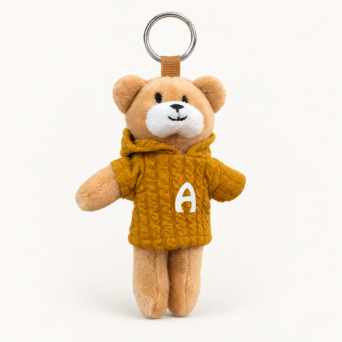 Porta-chaves de ursinho de peluche com camisola amarelo-mostarda e letra A