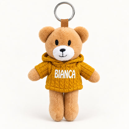 Ursinho Bianca — vista completa com argola, fundo branco