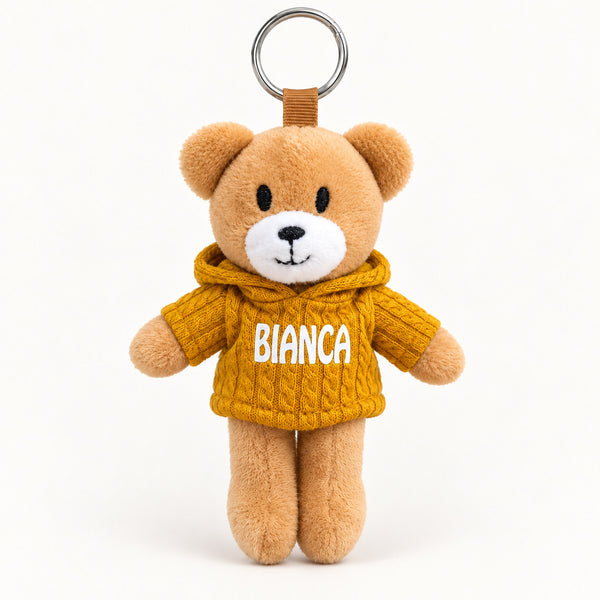 Ursinho Bianca — vista completa com argola, fundo branco
