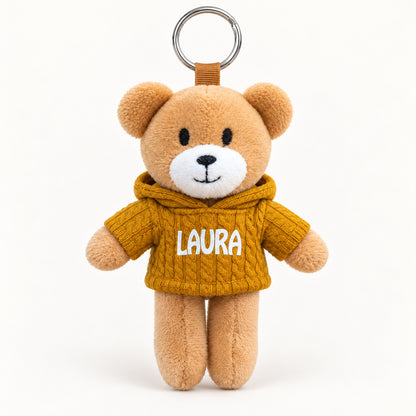 Ursinho Laura — vista completa com argola, fundo branco