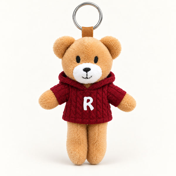 Ursinho R — vista completa com argola, fundo branco
