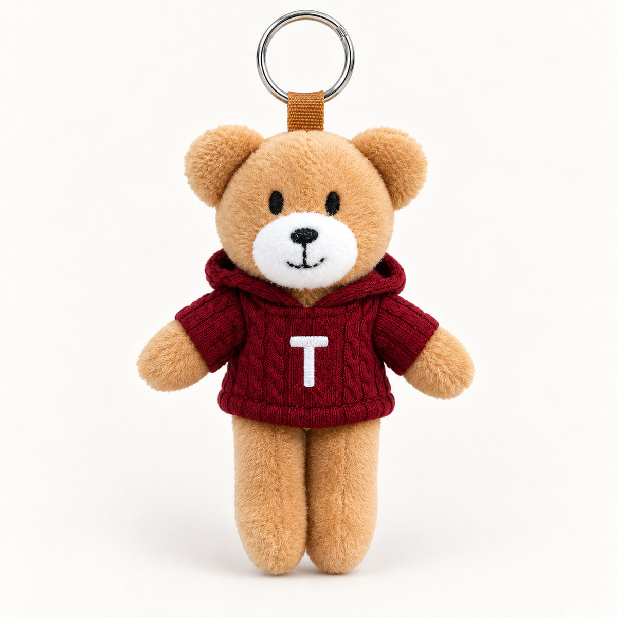 Ursinho T — vista completa com argola, fundo branco