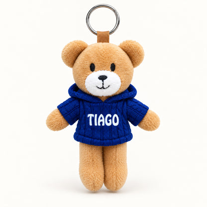 Ursinho Tiago — vista completa com argola, fundo branco